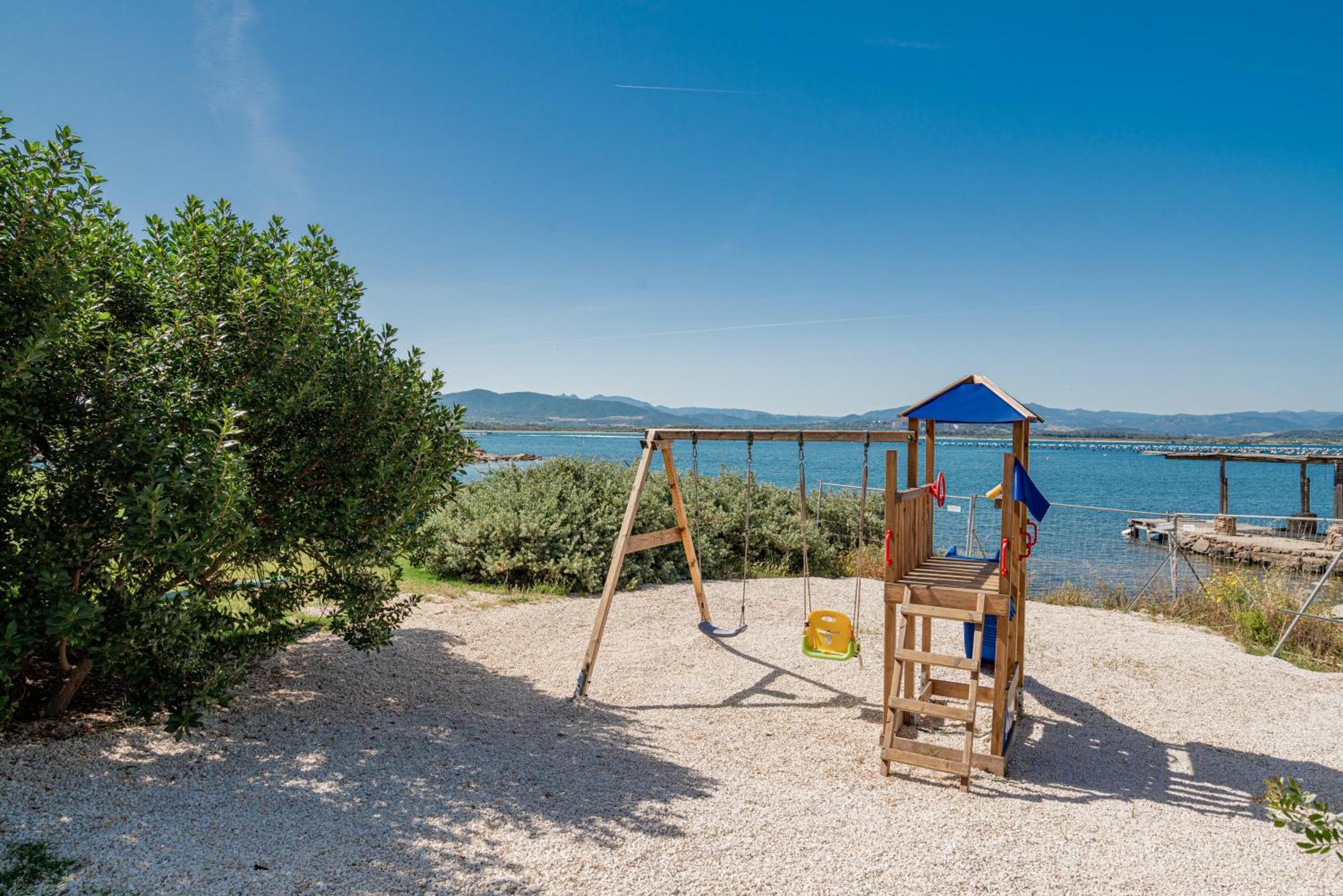 Case Al Mare Di Cala Saccaia Pittulongu Kültér fotó